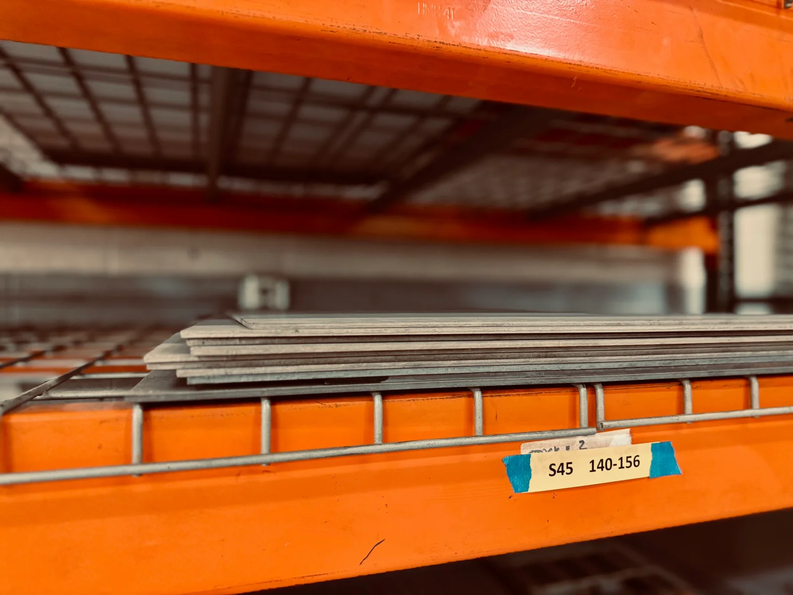 S45VN stainless steel stock labeled S45 140-156 on factory shelf at Medford Knife and Tool Phoenix Arizona