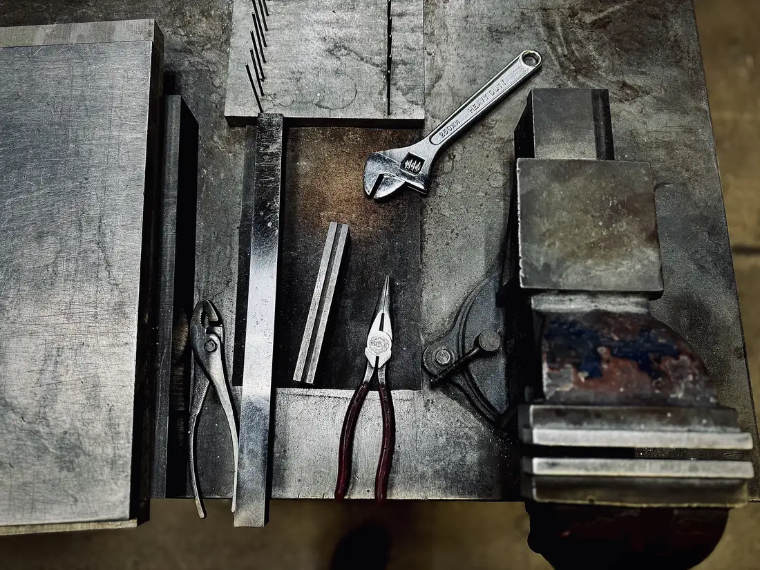 Overhead view of the blade straightening station at Medford Knife