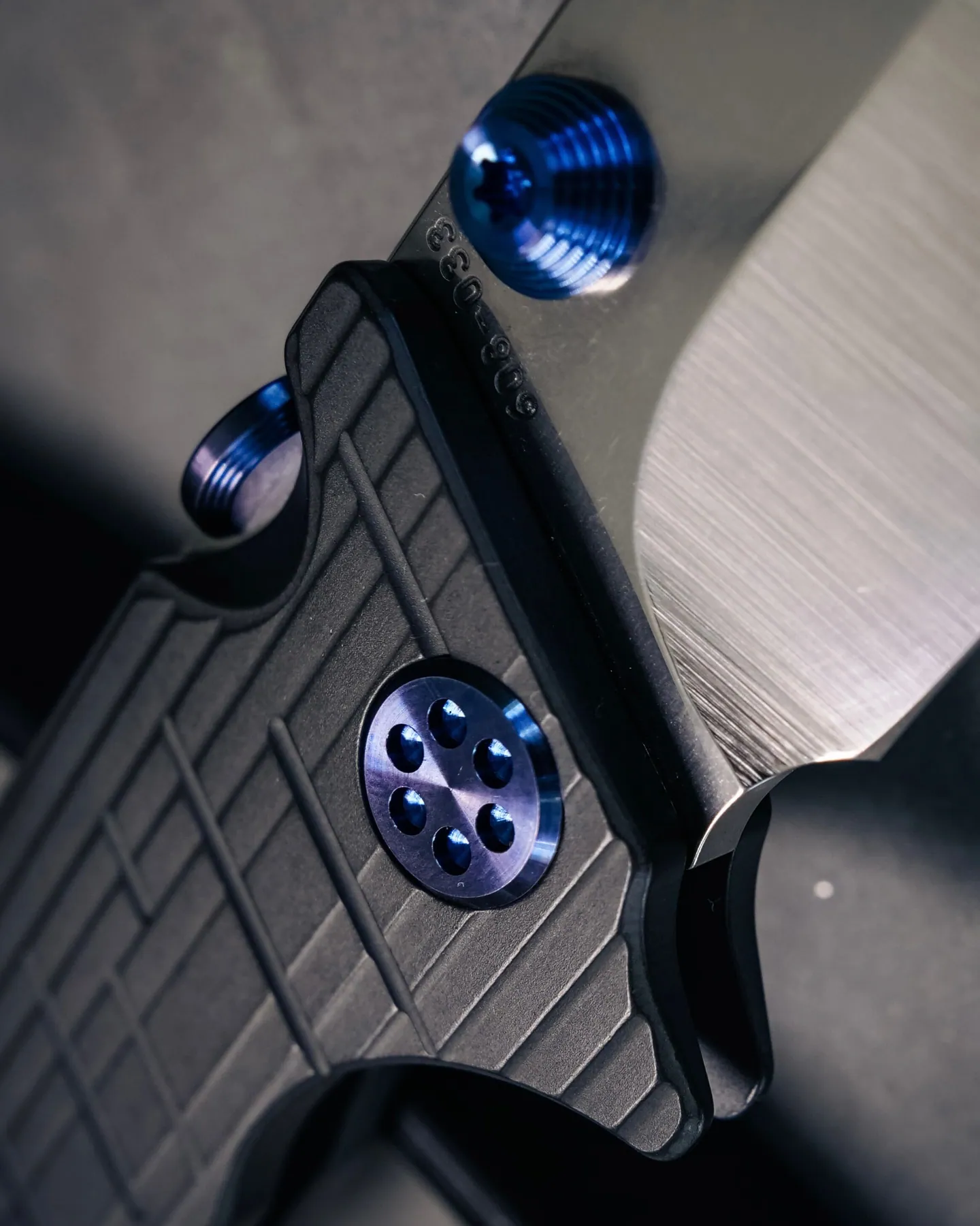 Detail of blue Torrent pivot and handle hardware