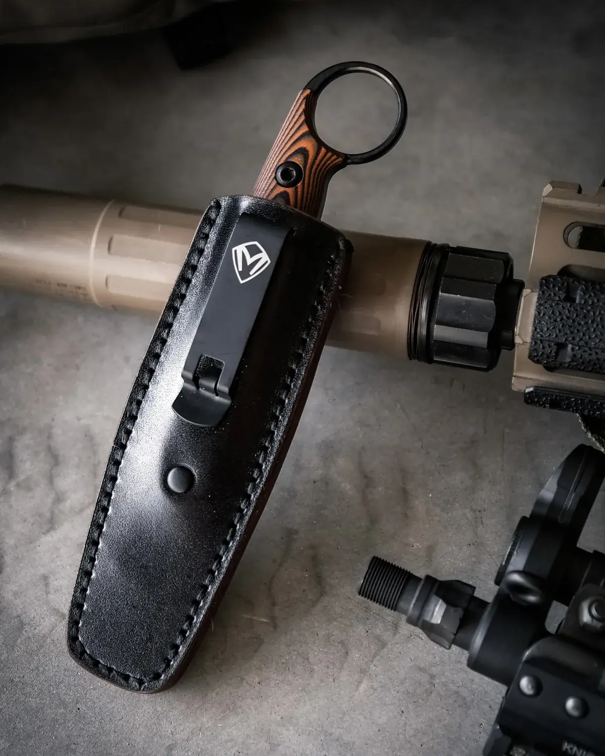 Taskmaster Wharncliffe Orange in sheath