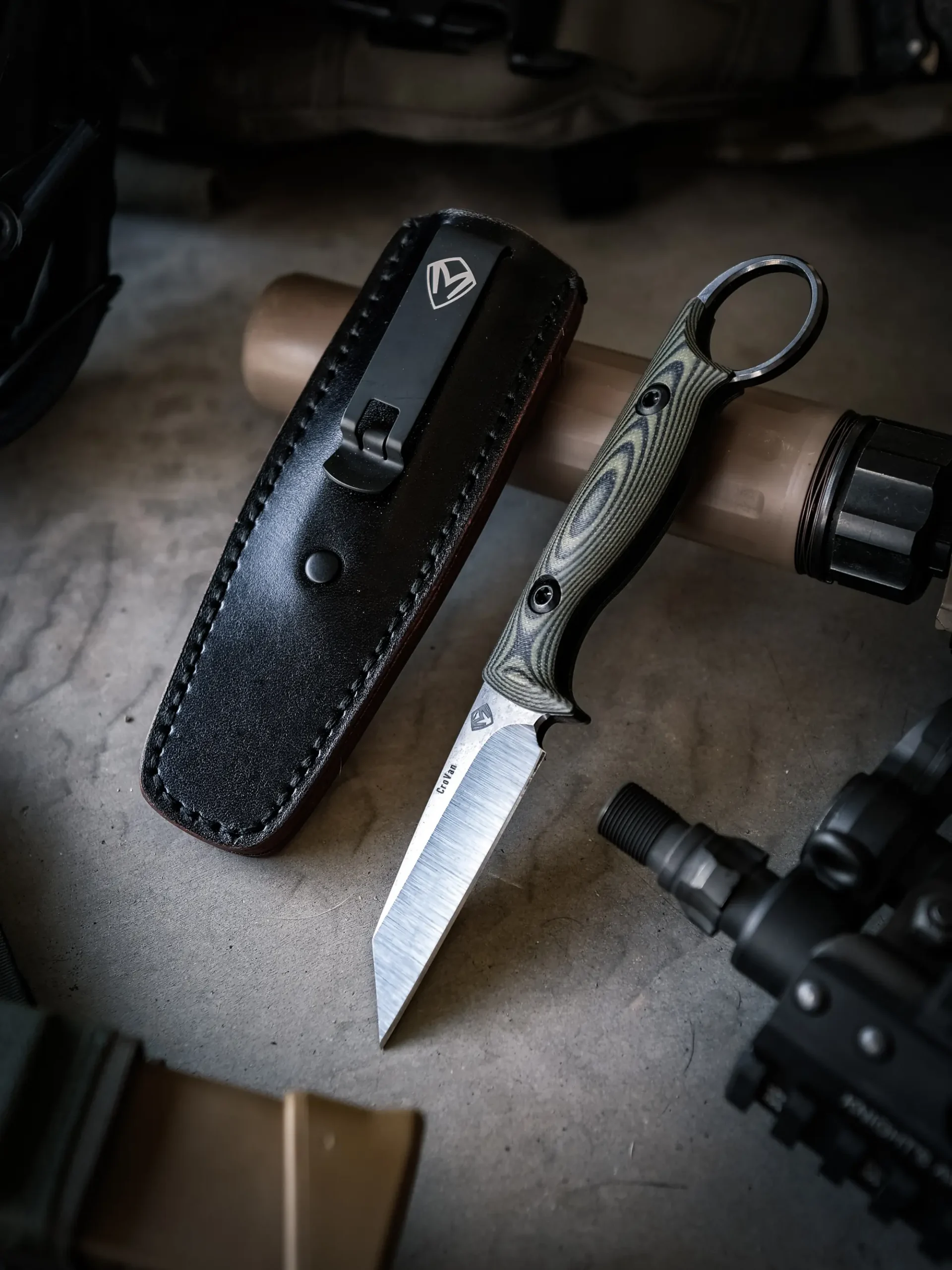 Taskmaster Wharncliffe green handles in hand